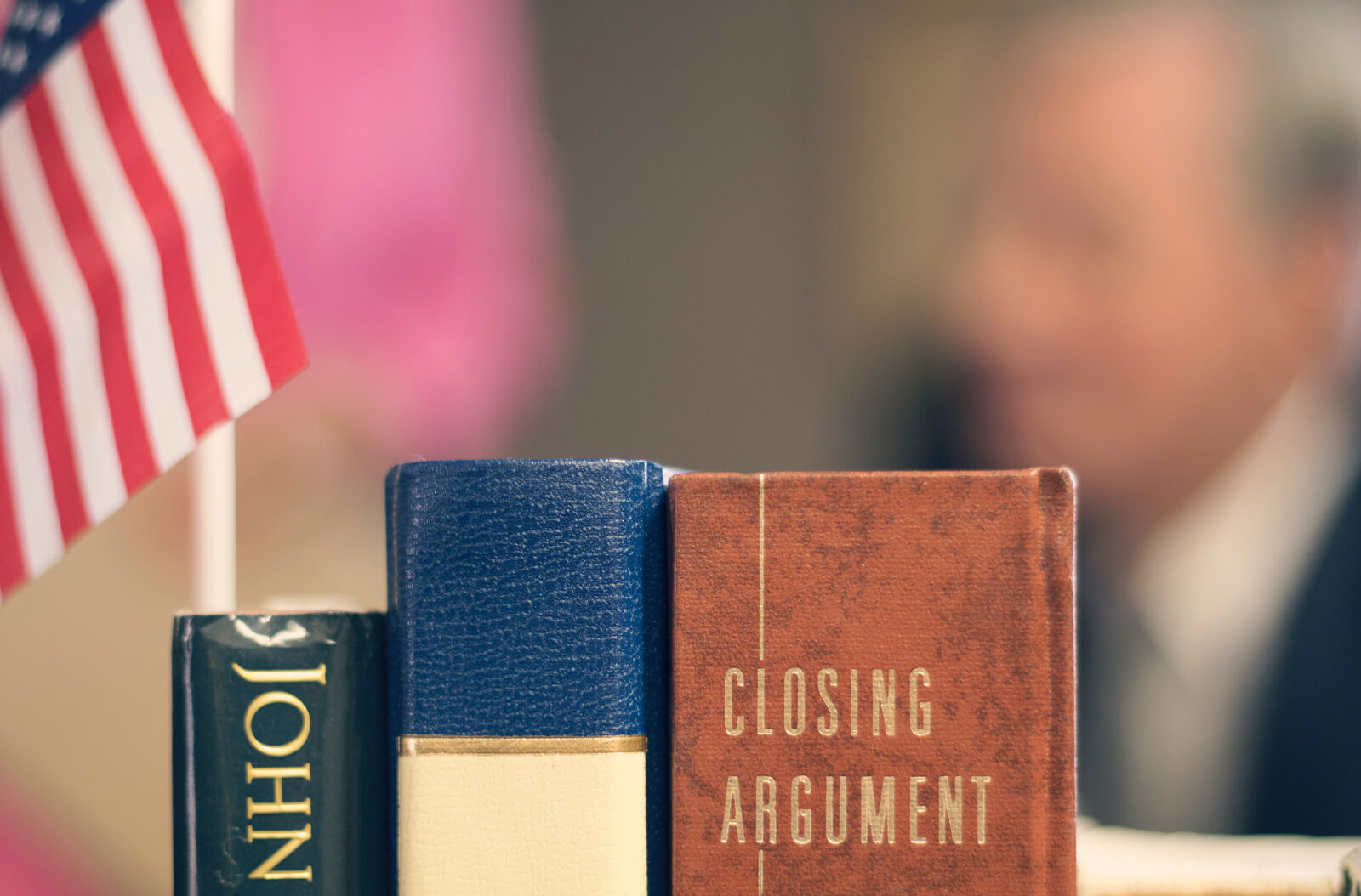 Legal books and reference material on a desk.